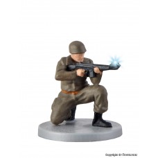 VI1531 H0 Soldier, kneeling with gun and muzzle flash