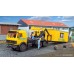 KI16310 H0 LP charger loader with GleisBau office container