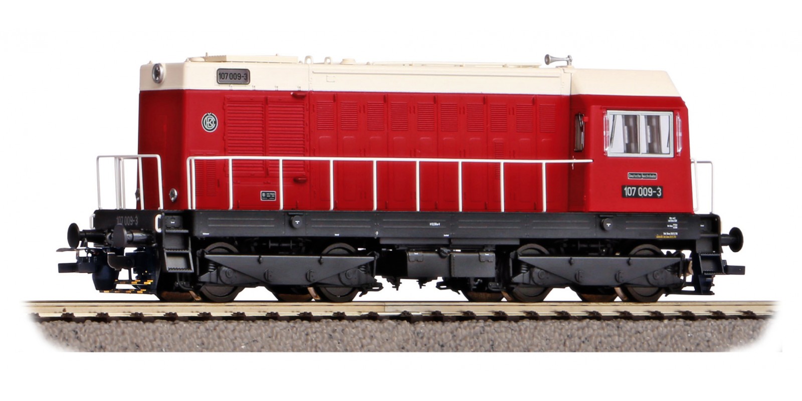 PI55911 Gauge H0 Diesel locomotive BR 107 in red of the DR, epoch IV with sound